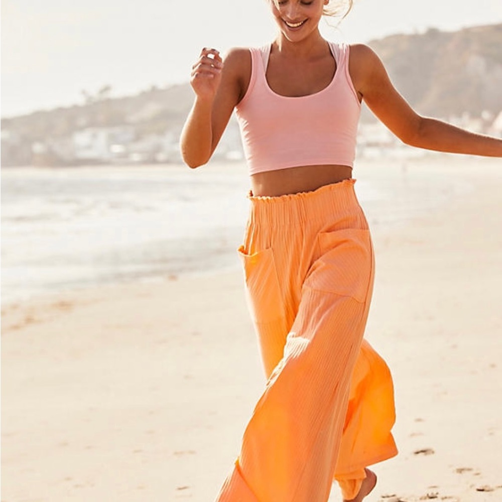 Free People movement Blissed Out wide leg pants in bright orange L